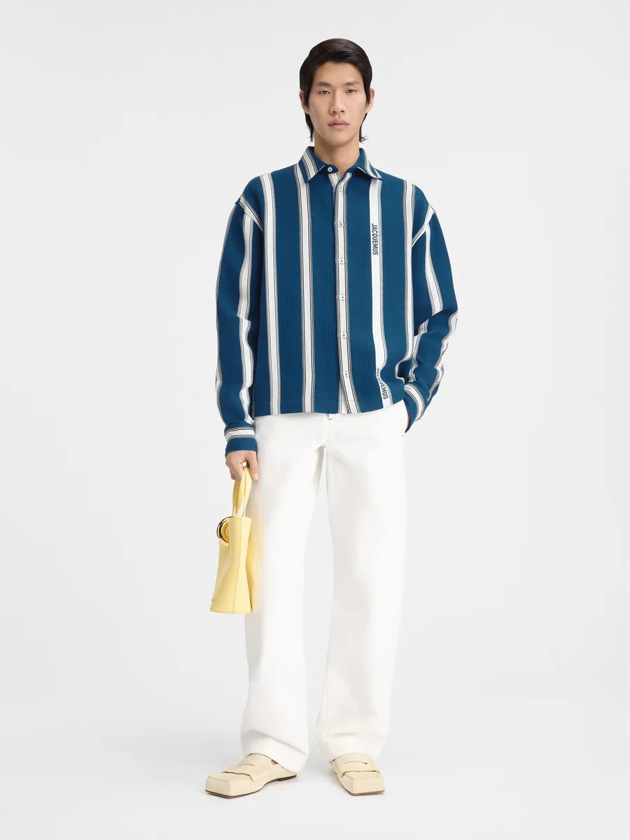 Полосатая рубашка свободного кроя La Папье Jacquemus, белый
Полосатая рубашка свободного кроя La Папье Jacquemus, белый