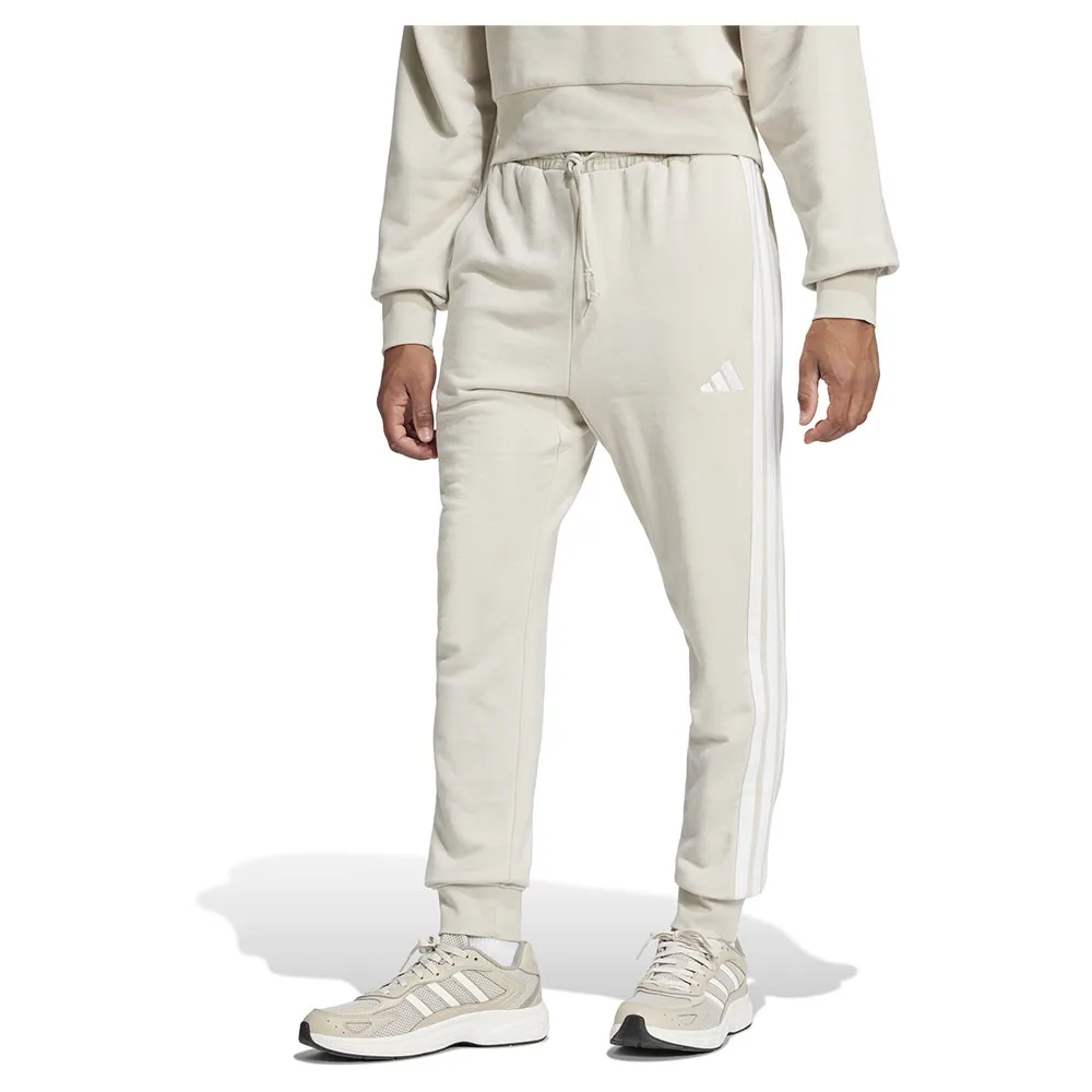 Джоггеры adidas Essential 3 Stripes French Terry, бежевый
Джоггеры adidas Essential 3 Stripes French Terry, бежевый