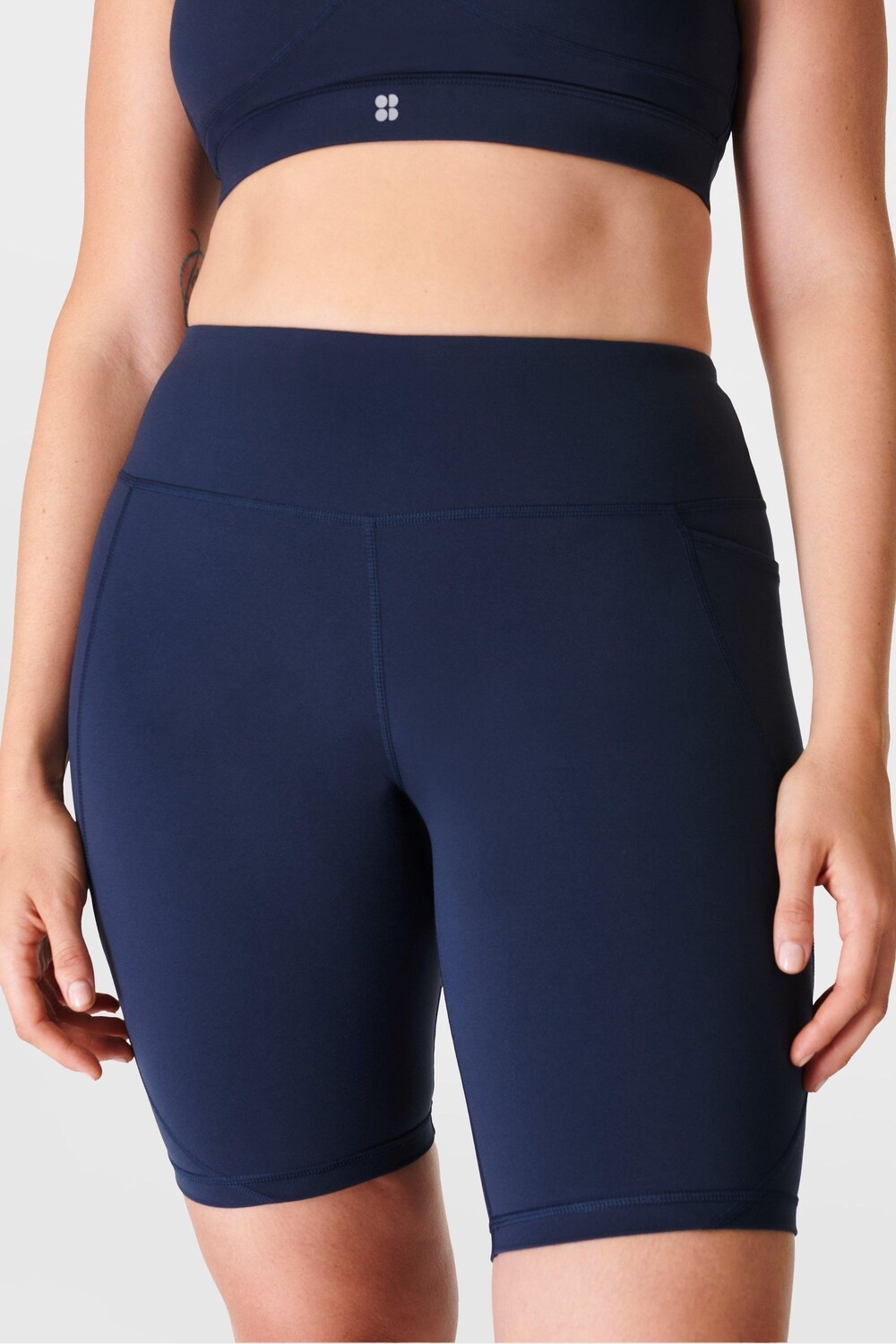 Кораллово розовые байкерские шорты Power 9" Sweaty Betty, синий
Кораллово розовые байкерские шорты Power 9" Sweaty Betty, синий