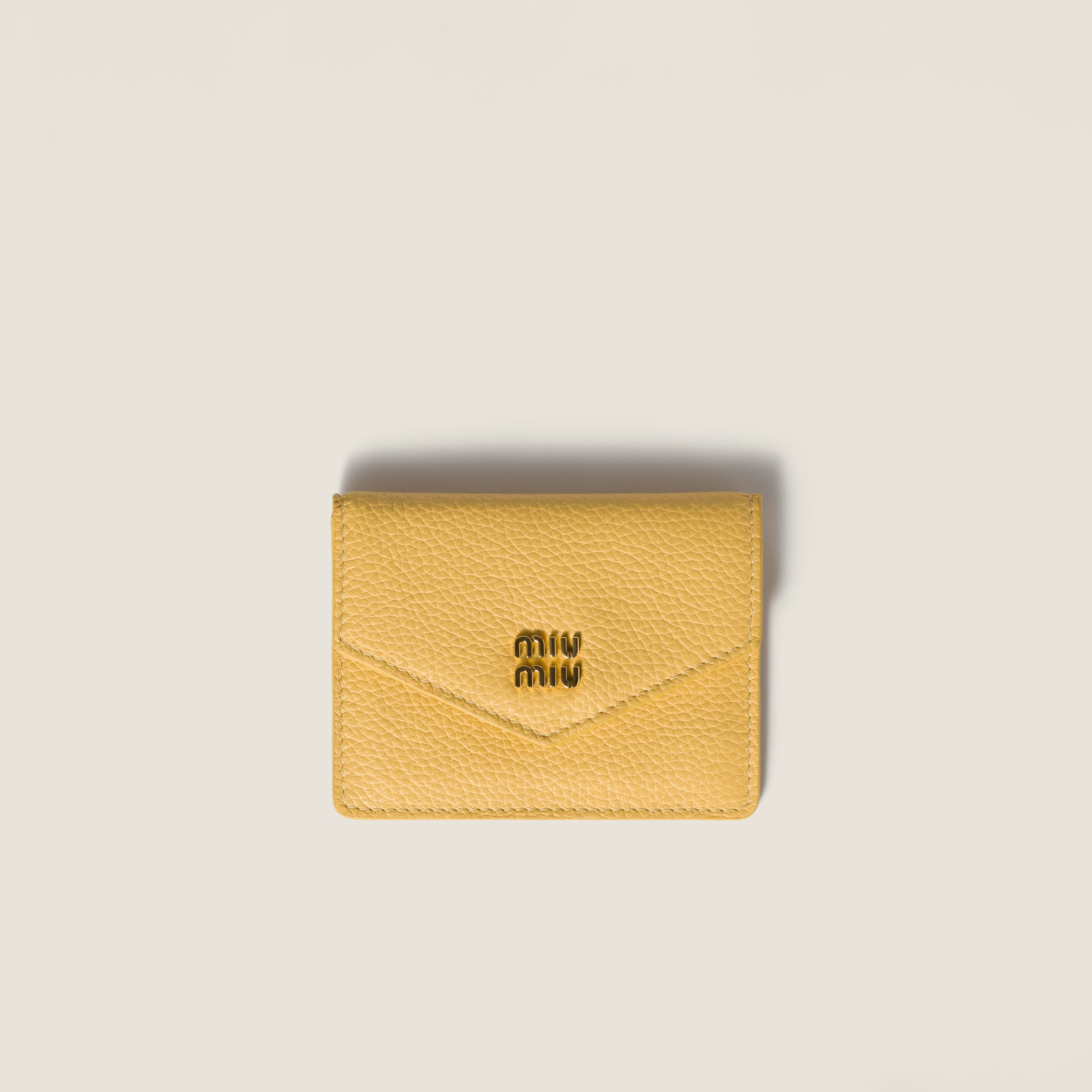 Кожаный держатель для карт MIU MIU, желтый
Кожаный держатель для карт MIU MIU, желтый