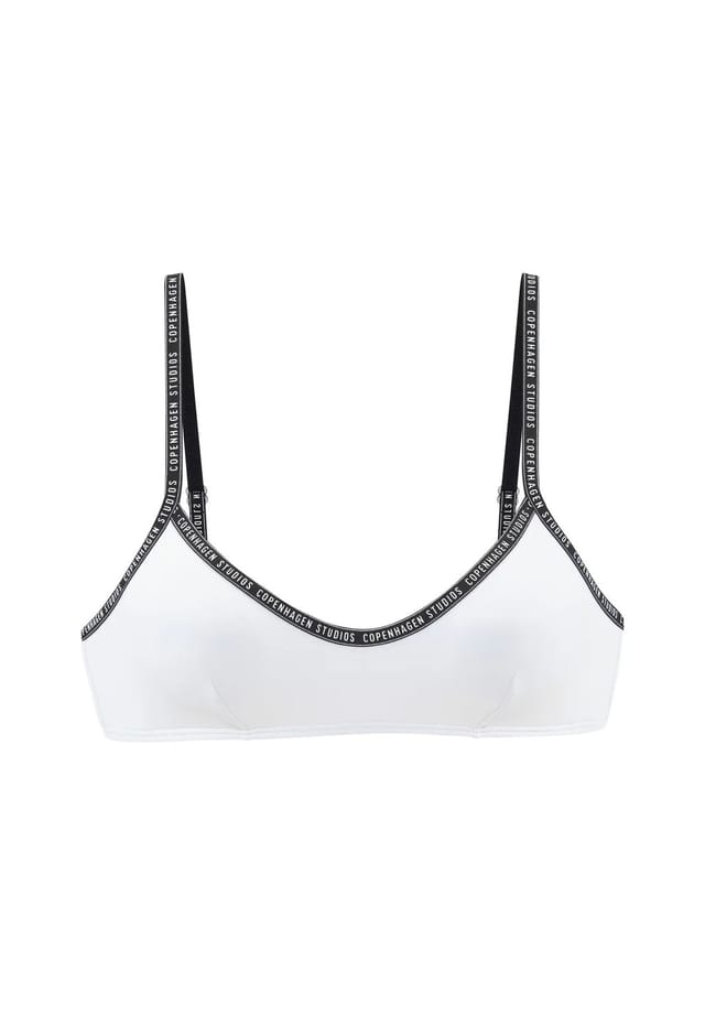 Коди бюстье бикини "топ" логотип на ленте Copenhagen Studios, белый
Коди бюстье бикини "топ" логотип на ленте Copenhagen Studios, белый