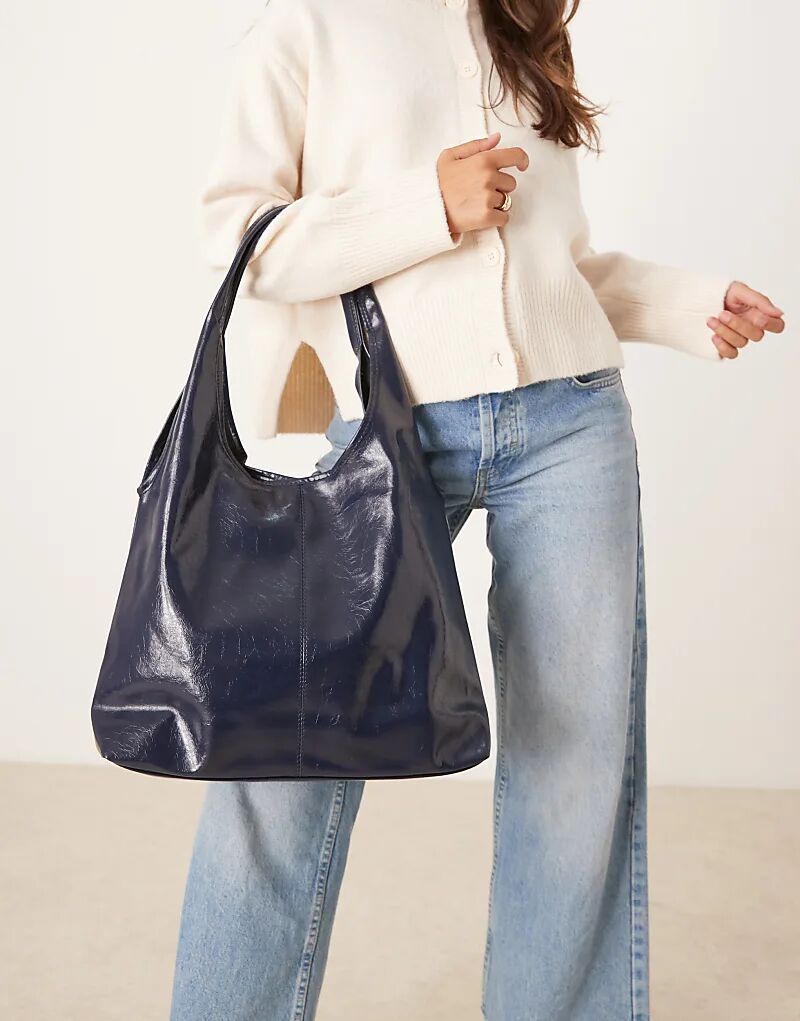 Сумка-тоут ASOS DESIGN с круглой ручкой темно-синего цвета
Сумка-тоут ASOS DESIGN с круглой ручкой темно-синего цвета