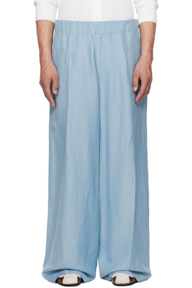 Синие брюки на завязках Dries Van Noten
Синие брюки на завязках Dries Van Noten