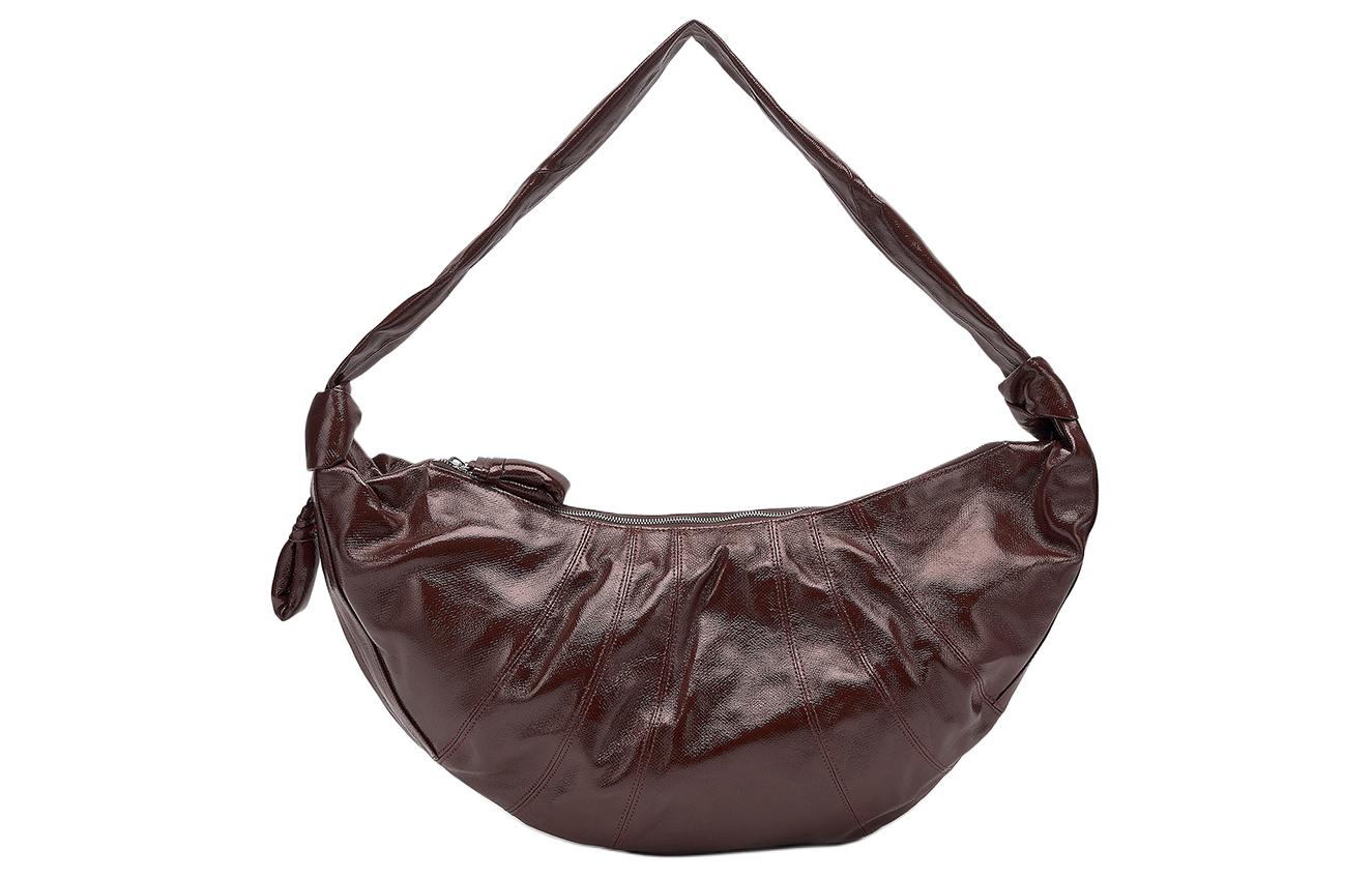 Lemaire Кожаная сумка круассан через плечо на ремне шоколадного цвета
Lemaire Кожаная сумка круассан через плечо на ремне шоколадного цвета