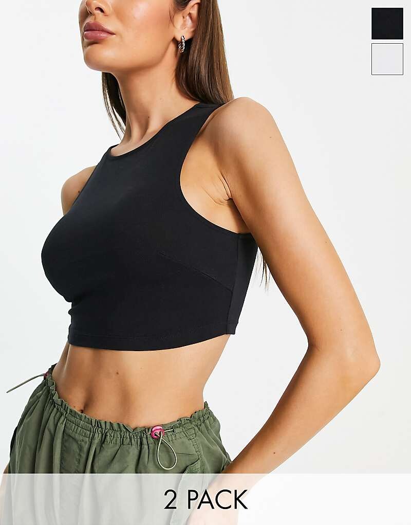 Супер укороченная черно-белая майка с высоким воротником ASOS Design – = набор из 2 штук
Супер укороченная черно-белая майка с высоким воротником ASOS Design – = набор из 2 штук