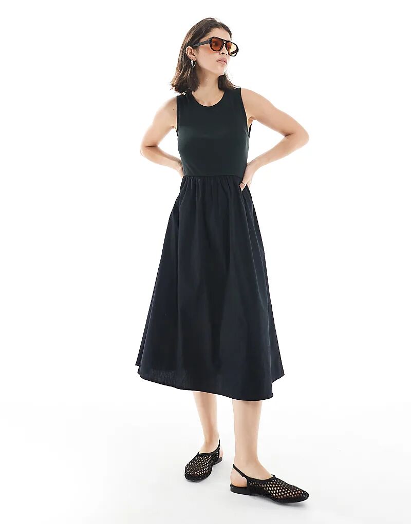 Платье миди без рукавов с плетеной юбкой черного цвета
Платье миди без рукавов с плетеной юбкой черного цвета