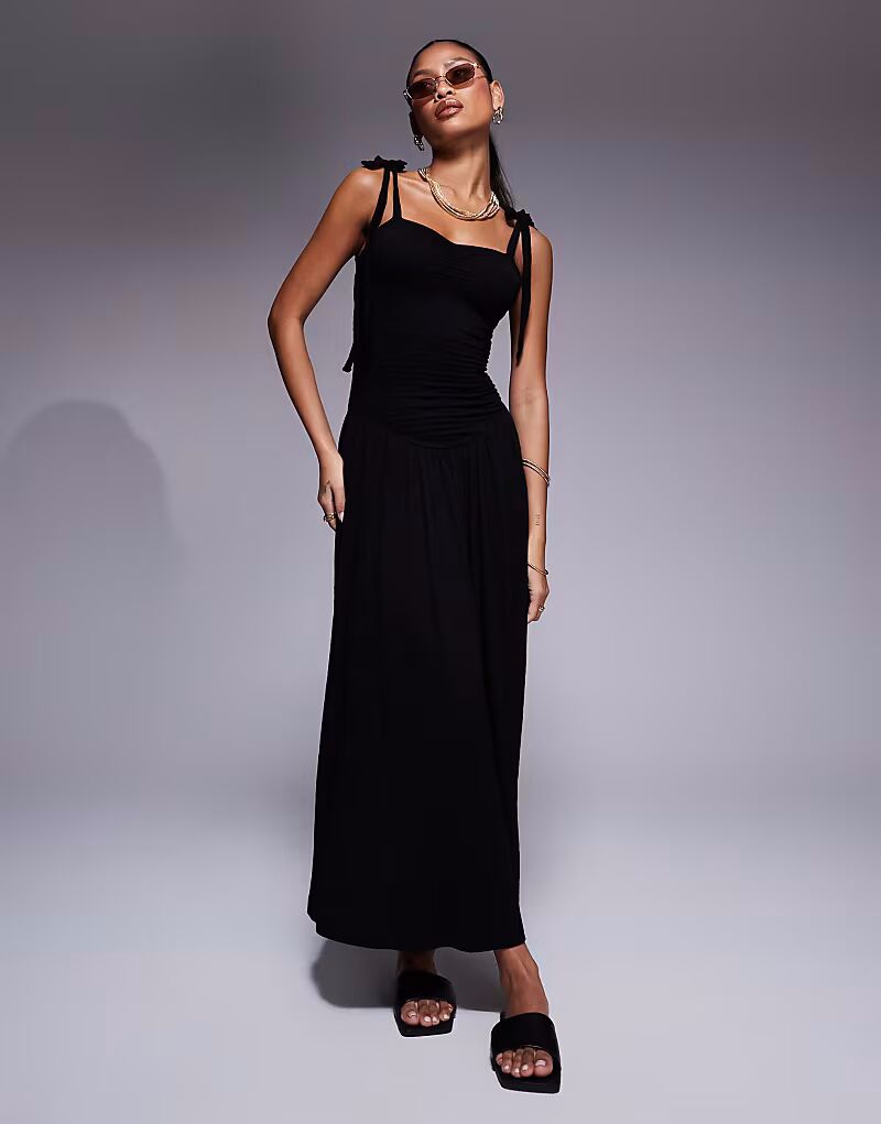 Сарафан миди с завязками на бретелях ASOS DESIGN черного цвета с жатым лифом и сборками
Сарафан миди с завязками на бретелях ASOS DESIGN черного цвета с жатым лифом и сборками