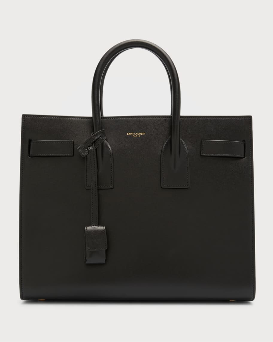 Маленькая кожаная сумка Sac De Jour с ручкой сверху Saint Laurent
Маленькая кожаная сумка Sac De Jour с ручкой сверху Saint Laurent