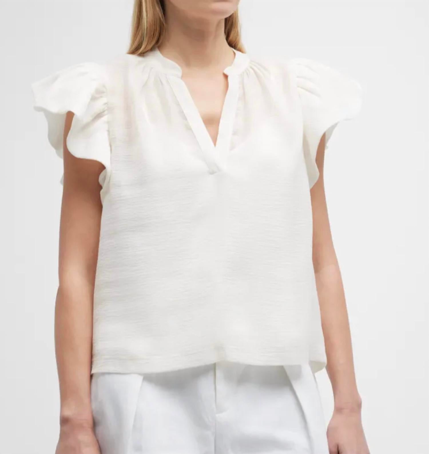 Топ с оборками Ayme белого цвета JONATHAN SIMKHAI
Топ с оборками Ayme белого цвета JONATHAN SIMKHAI