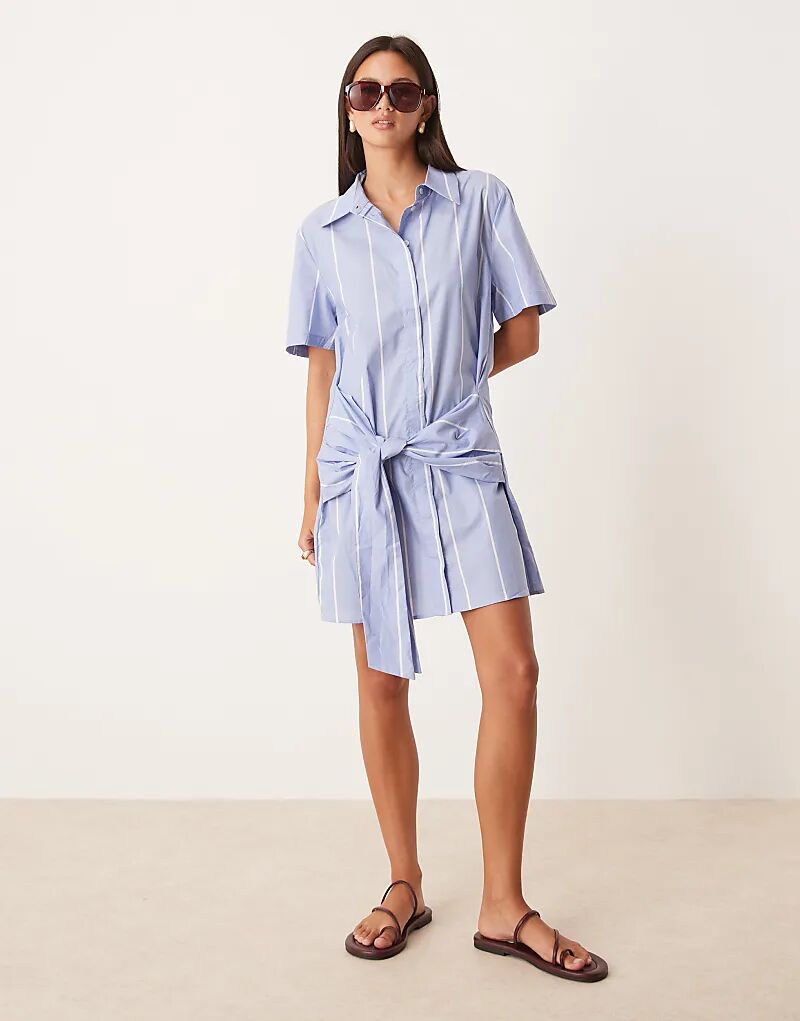 Платье-рубашка из хлопка Mango с завязкой на талии в светло-голубую полоску
Платье-рубашка из хлопка Mango с завязкой на талии в светло-голубую полоску