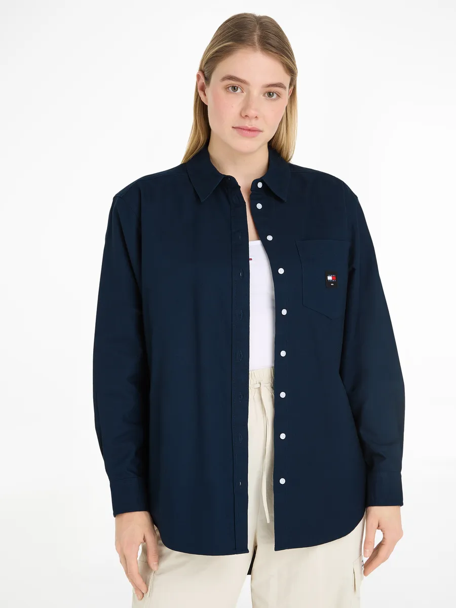 Блузка-топ Tommy Jeans "TJW BADGE BOYFRIEND SHIRT" с вышитым логотипом, цвет Dark_Night_Navy
Блузка-топ Tommy Jeans "TJW BADGE BOYFRIEND SHIRT" с вышитым логотипом, цвет Dark_Night_Navy