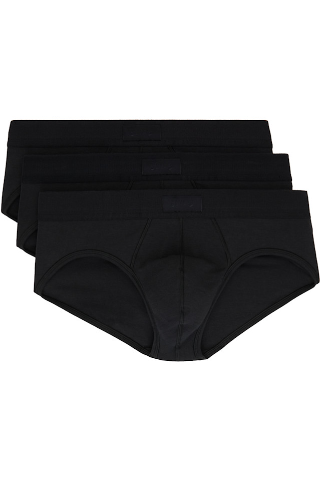 Тройная упаковка черных хлопковых трусов Skims Skims, цвет onyx
Тройная упаковка черных хлопковых трусов Skims Skims, цвет onyx