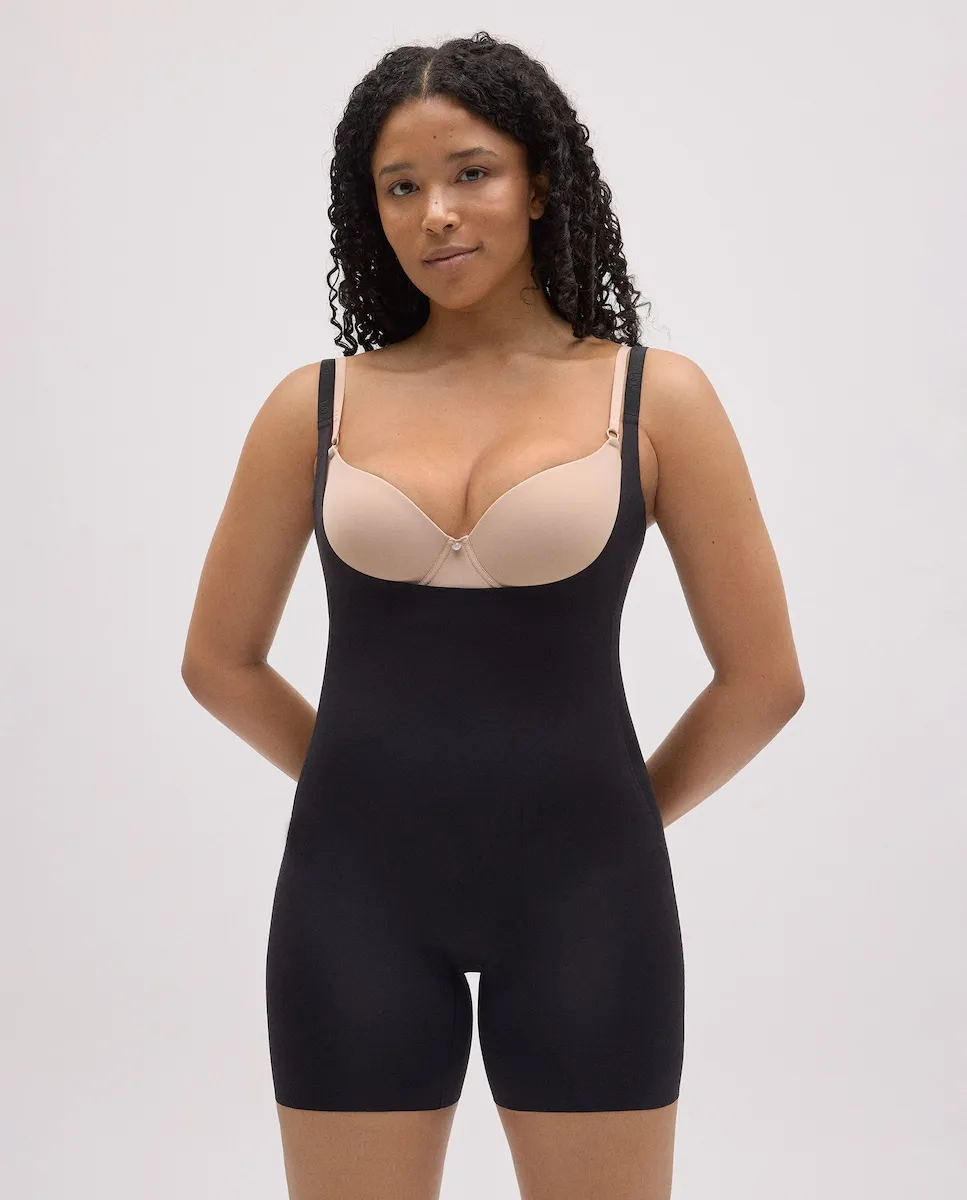 Корректирующее боди с открытой конструкцией и невидимыми швами Ysabel Mora, черный
Корректирующее боди с открытой конструкцией и невидимыми швами Ysabel Mora, черный