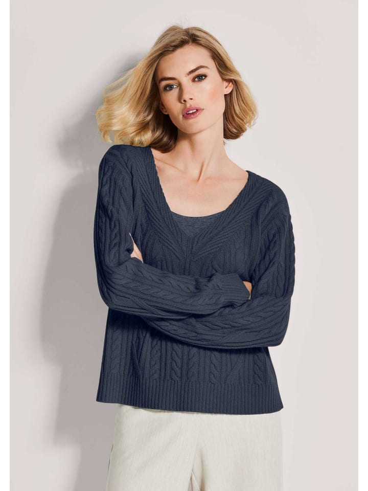 MADELEINE Кашемировый свитер с V-образным вырезом темно-синего цвета
MADELEINE Кашемировый свитер с V-образным вырезом темно-синего цвета