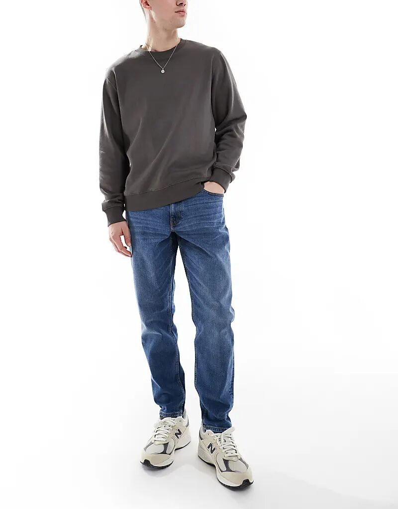 Зауженные джинсы стретч средней степени стертости ASOS DESIGN 
Зауженные джинсы стретч средней степени стертости ASOS DESIGN