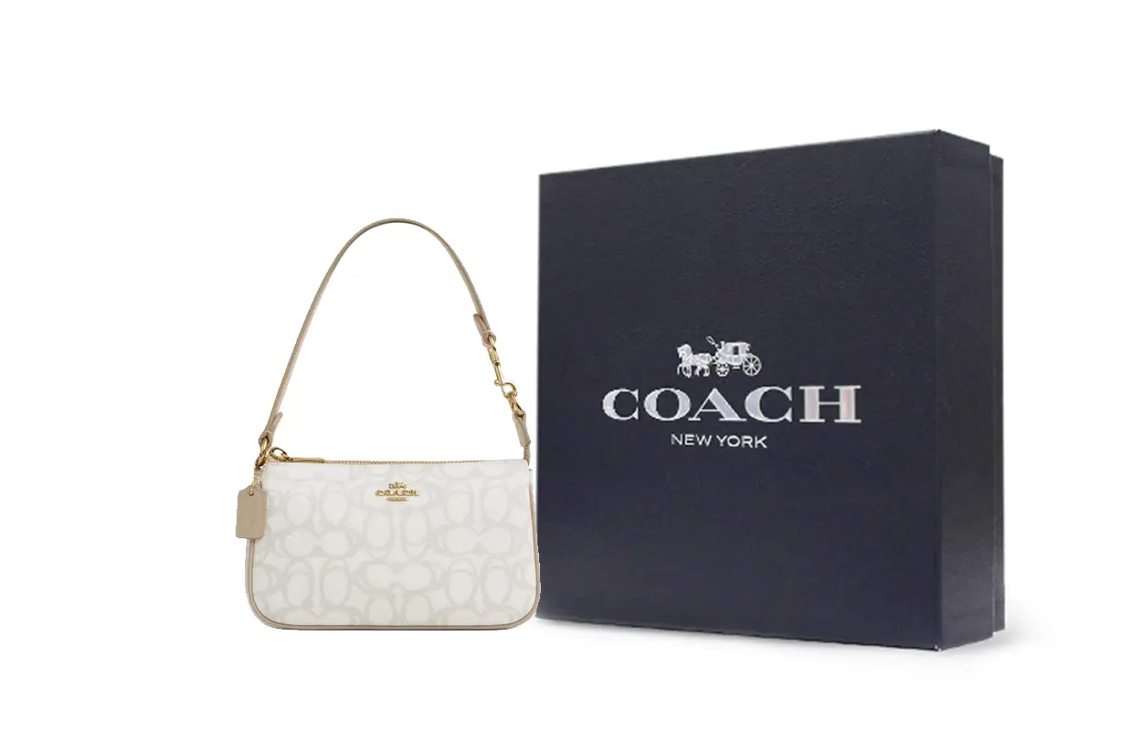 COACH Сумка через плечо из кожи с покрытием
COACH Сумка через плечо из кожи с покрытием