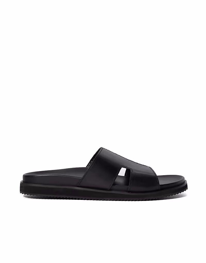 Шлепанцы в черном цвете Dune London
Шлепанцы в черном цвете Dune London