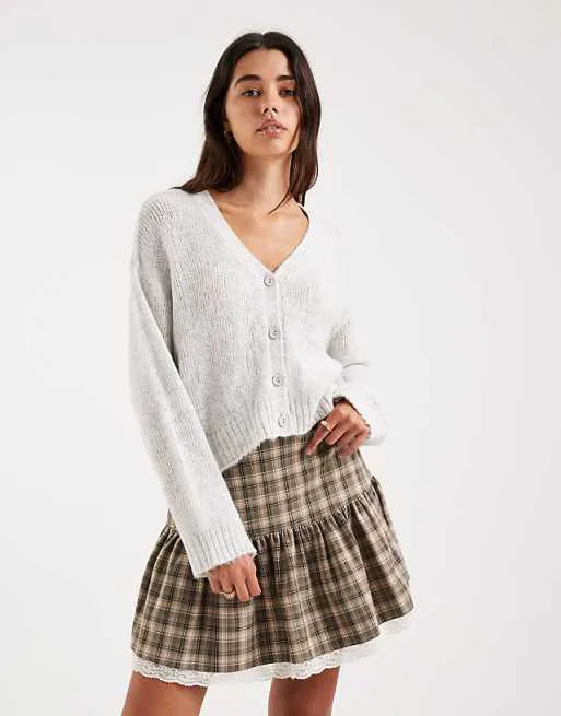 Серый вязаный кардиган открытой вязки ASOS DESIGN
Серый вязаный кардиган открытой вязки ASOS DESIGN