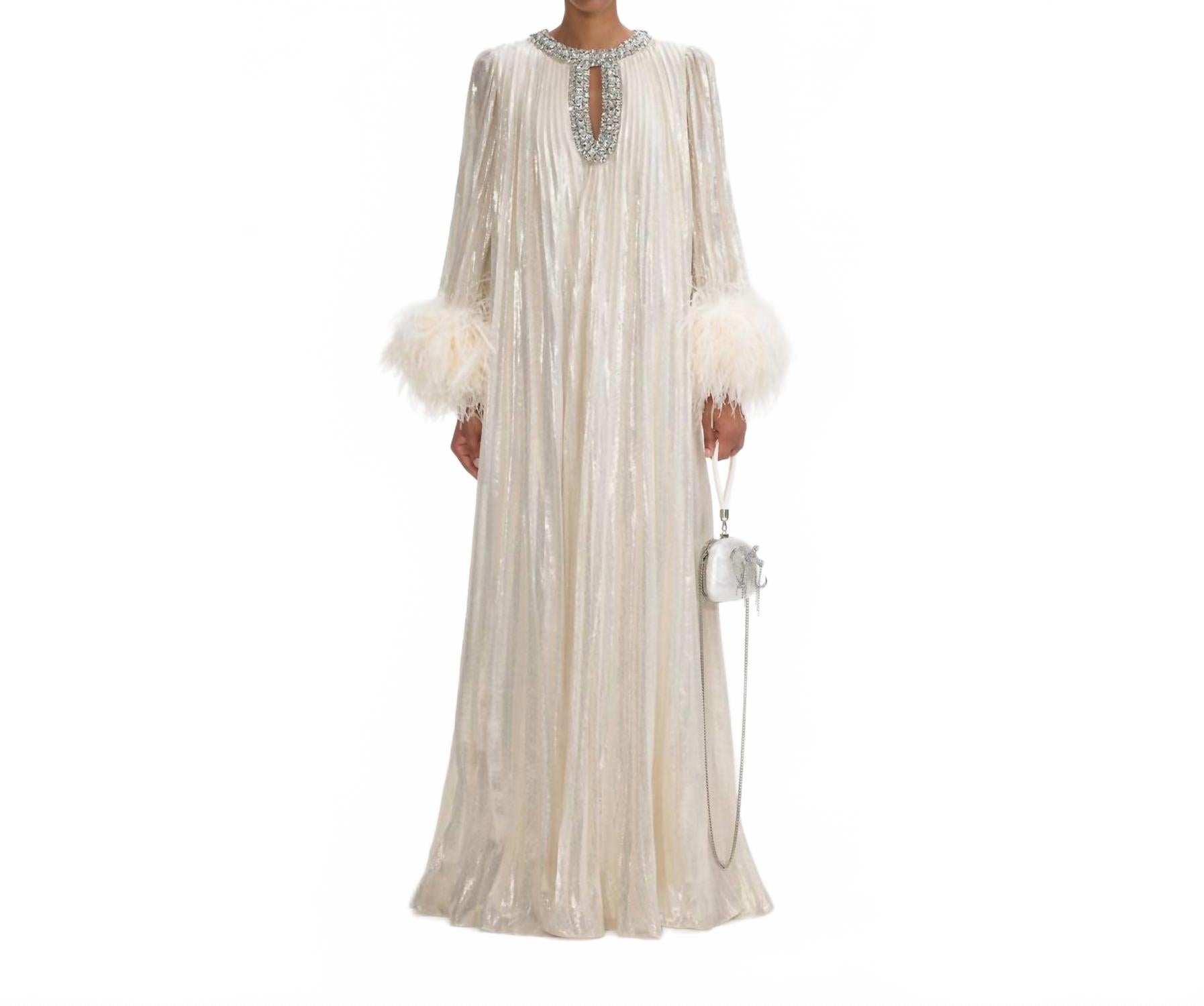 Желтое металлизированное макси-платье с перьями Self-Portrait
Желтое металлизированное макси-платье с перьями Self-Portrait