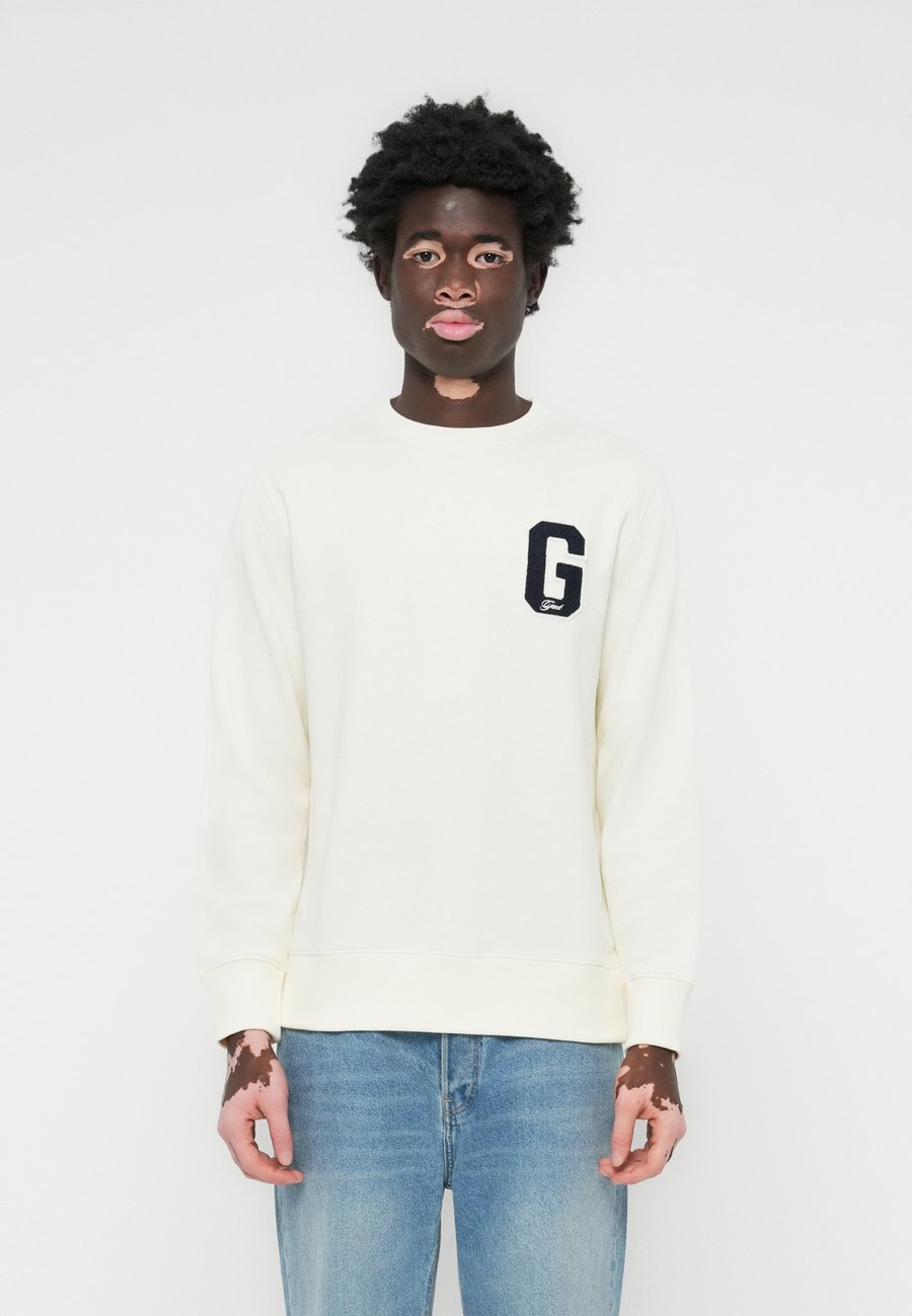 Толстовка GANT BADGE , Cream/Off-White
Толстовка GANT BADGE , Cream/Off-White