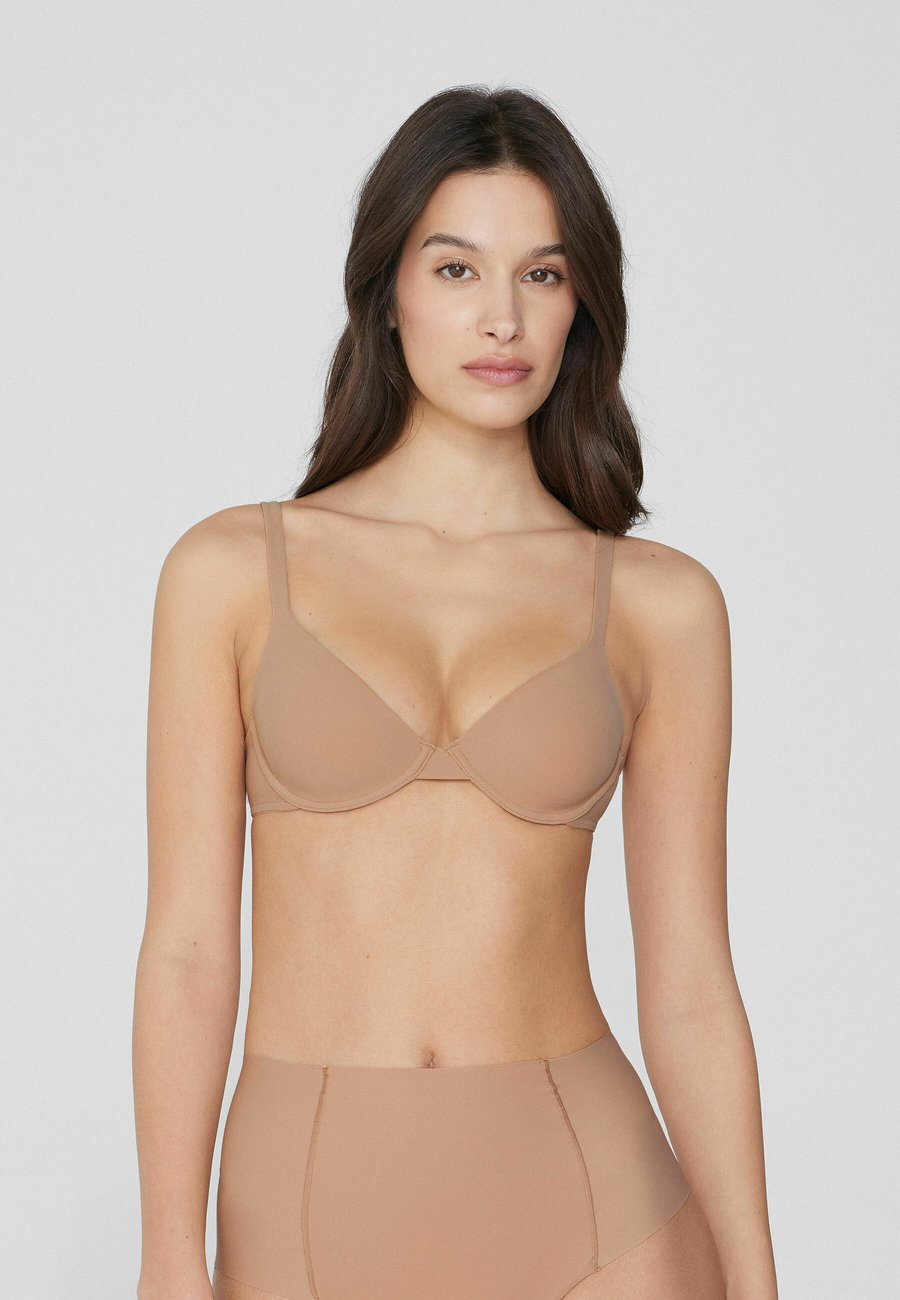 Бюстгальтер Tezenis Triangle bra, Nude/Nude
Бюстгальтер Tezenis Triangle bra, Nude/Nude