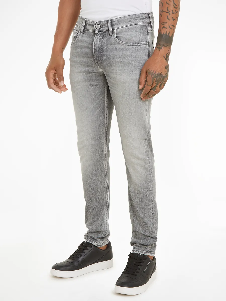 Узкие джинсы Calvin Klein Jeans SLIM TAPER классической формы с пятью карманами, серый
Узкие джинсы Calvin Klein Jeans SLIM TAPER классической формы с пятью карманами, серый