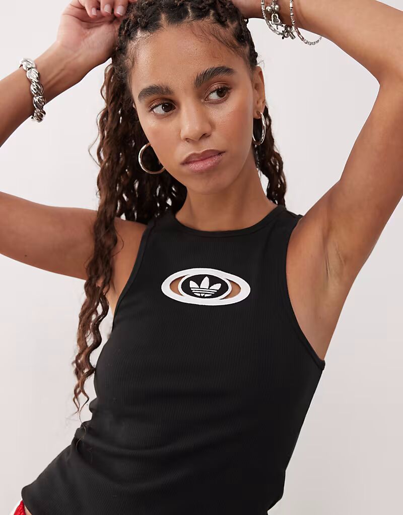 Майка Adidas Originals 00-х с ребристым узором, черная
Майка Adidas Originals 00-х с ребристым узором, черная