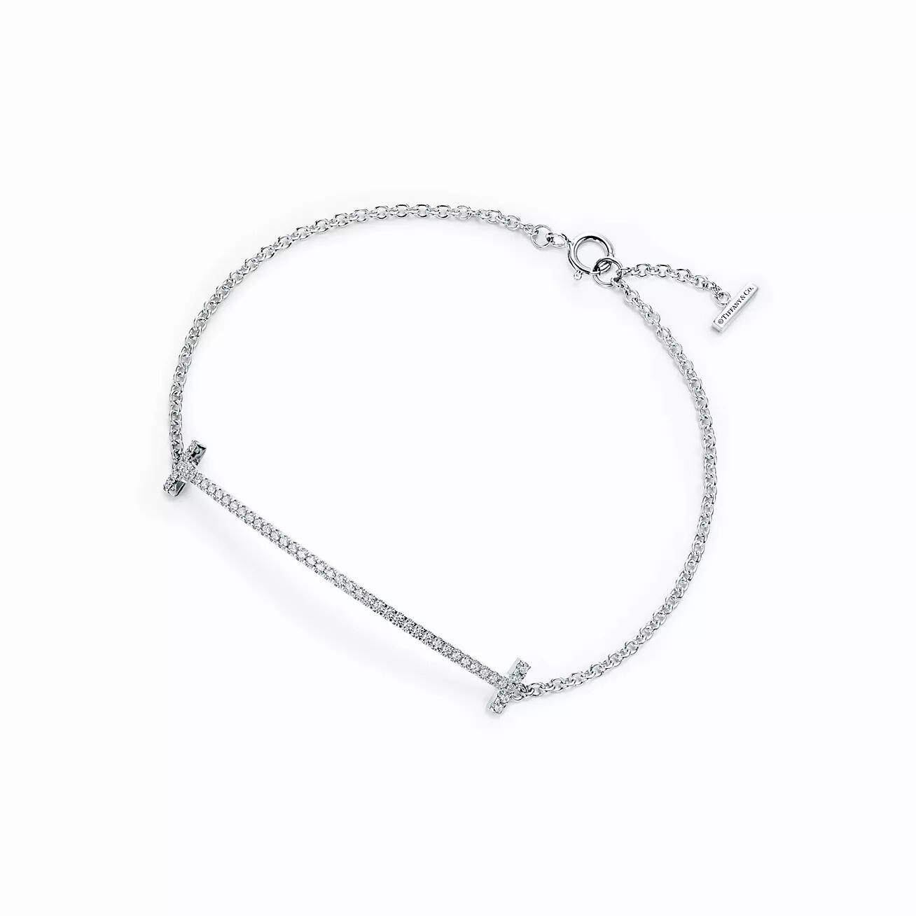 Браслет Tiffany & Co. T Smile, белое золото/бриллианты
Браслет Tiffany & Co. T Smile, белое золото/бриллианты
