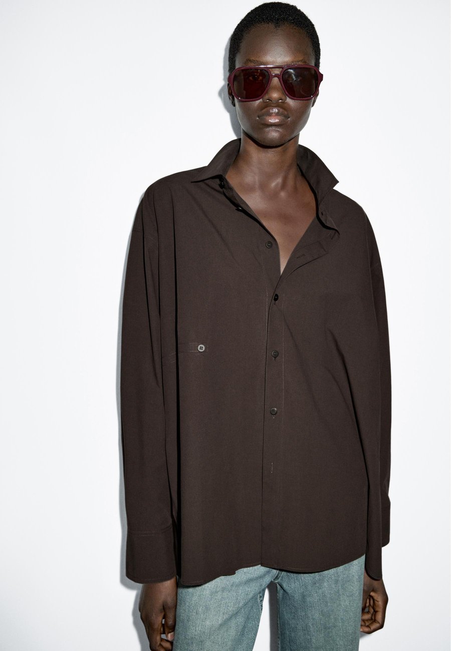 Блуза Massimo Dutti ASYMMETRIC BUTTON-UP GARMENT, Dark Brown
Блуза Massimo Dutti ASYMMETRIC BUTTON-UP GARMENT, Dark Brown