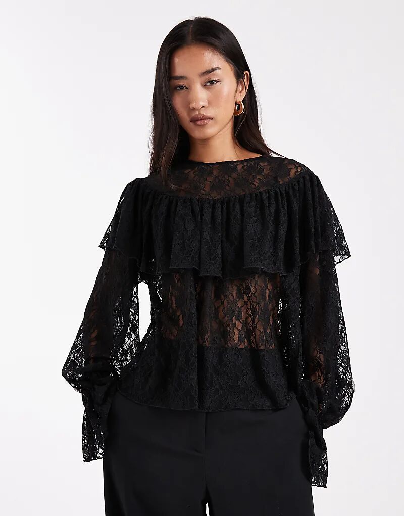 Прозрачная кружевная блузка Vero Moda с оборками и рукавами-поэтами черного цвета
Прозрачная кружевная блузка Vero Moda с оборками и рукавами-поэтами черного цвета