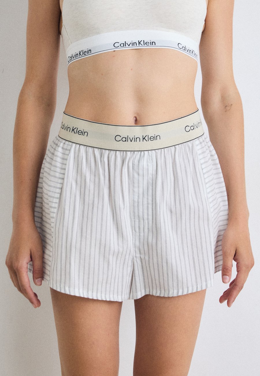 Пижамные брюки Calvin Klein Underwear LOGO SUPER, Classic White/Multi-Coloured
Пижамные брюки Calvin Klein Underwear LOGO SUPER, Classic White/Multi-Coloured