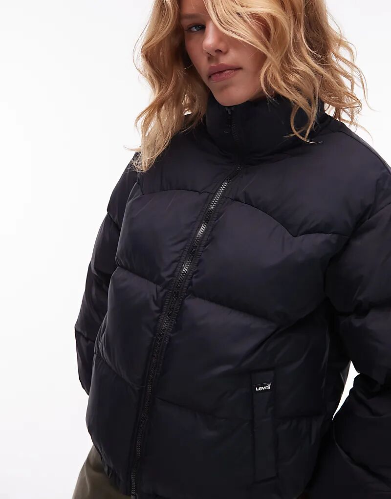 Куртка-пуховик Levi's Noe из нейлона в стиле вестерн черного цвета
Куртка-пуховик Levi's Noe из нейлона в стиле вестерн черного цвета