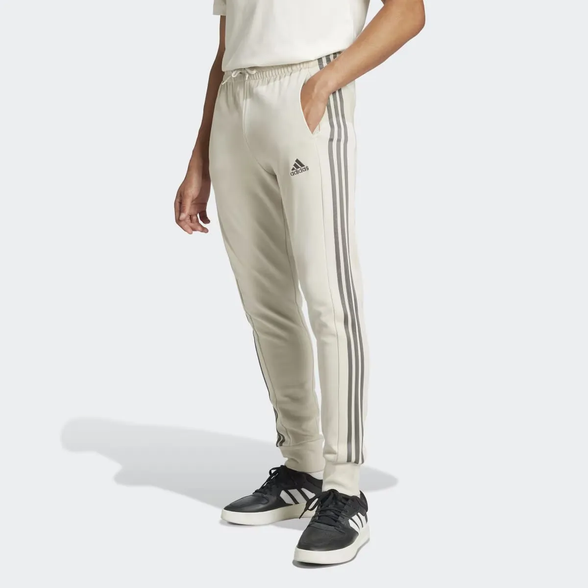 Мужские брюки Adidas Essentials French Terry Tapered Cuff с тремя полосками, бежевый
Мужские брюки Adidas Essentials French Terry Tapered Cuff с тремя полосками, бежевый