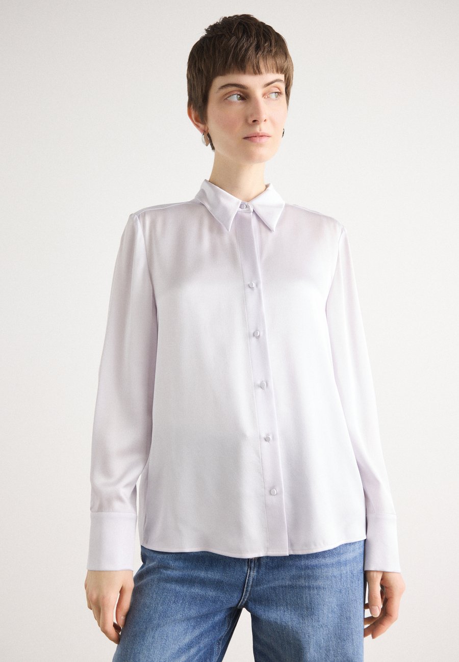 Блуза Marc Cain Button-down blouse, Soft Lavender/Lilac
Блуза Marc Cain Button-down blouse, Soft Lavender/Lilac