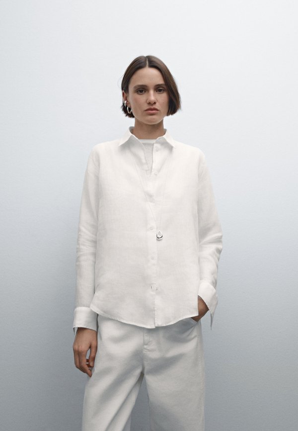 Струящаяся блузка на пуговицах Massimo Dutti, белый
Струящаяся блузка на пуговицах Massimo Dutti, белый