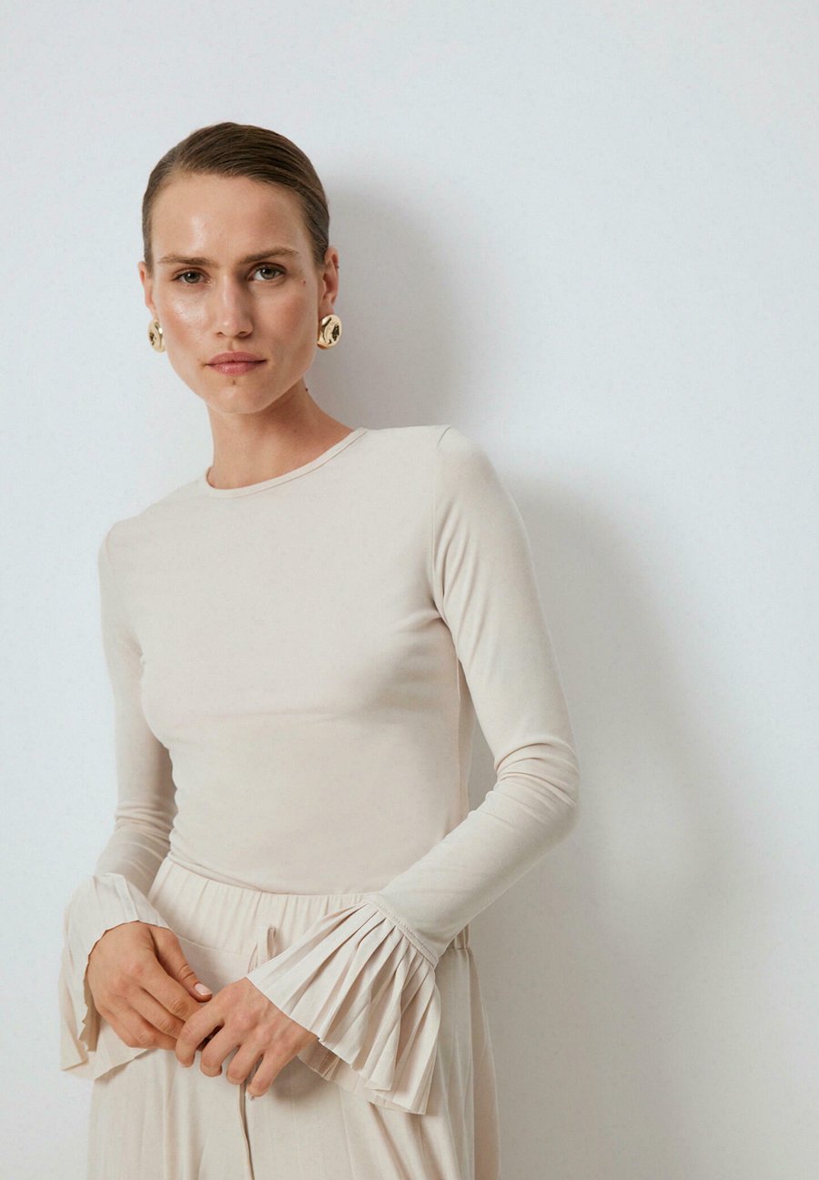 Топ Touché Privé PLEATED, Beige
Топ Touché Privé PLEATED, Beige