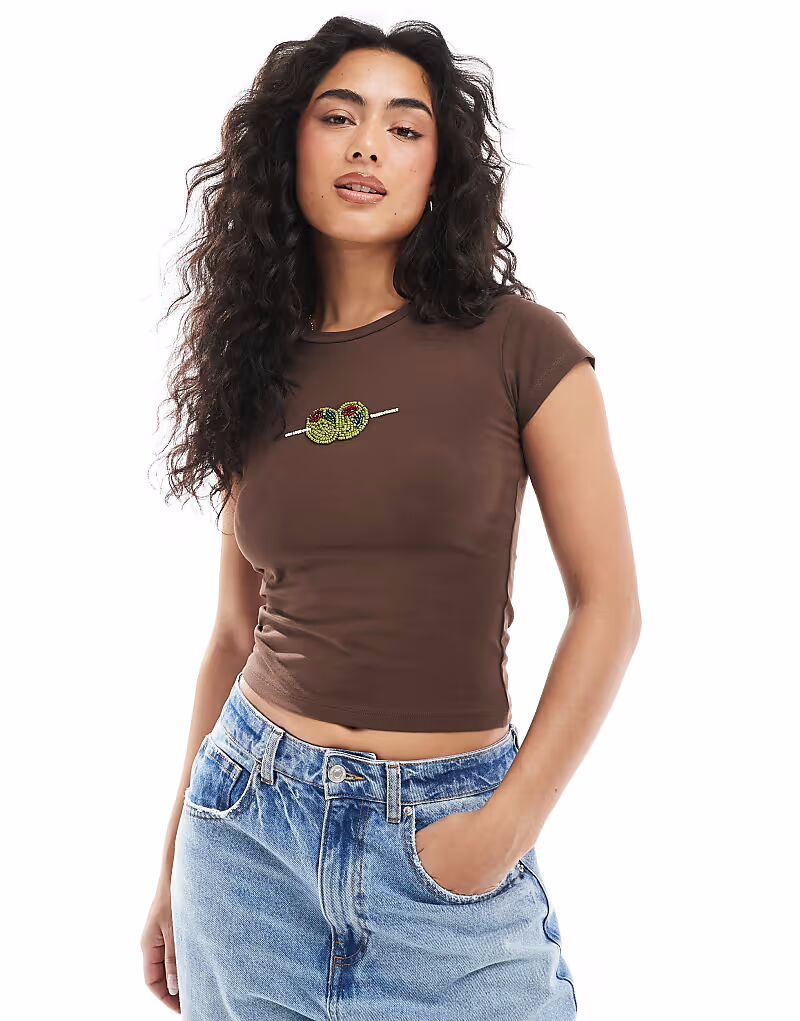 Укороченная детская футболка ASOS DESIGN с принтом в виде оливкового дерева, вышитым бисером, коричневого цвета
Укороченная детская футболка ASOS DESIGN с принтом в виде оливкового дерева, вышитым бисером, коричневого цвета