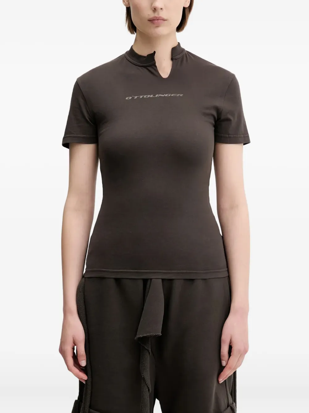 Футболка с графичным принтом Ottolinger, коричневый
Футболка с графичным принтом Ottolinger, коричневый