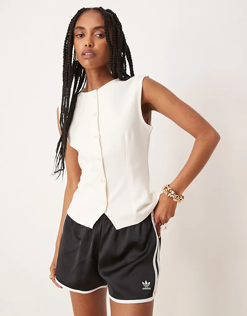 Жилет ASOS DESIGN из флиса с острыми плечами и застежкой на пуговицы цвета кокосового молока
Жилет ASOS DESIGN из флиса с острыми плечами и застежкой на пуговицы цвета кокосового молока