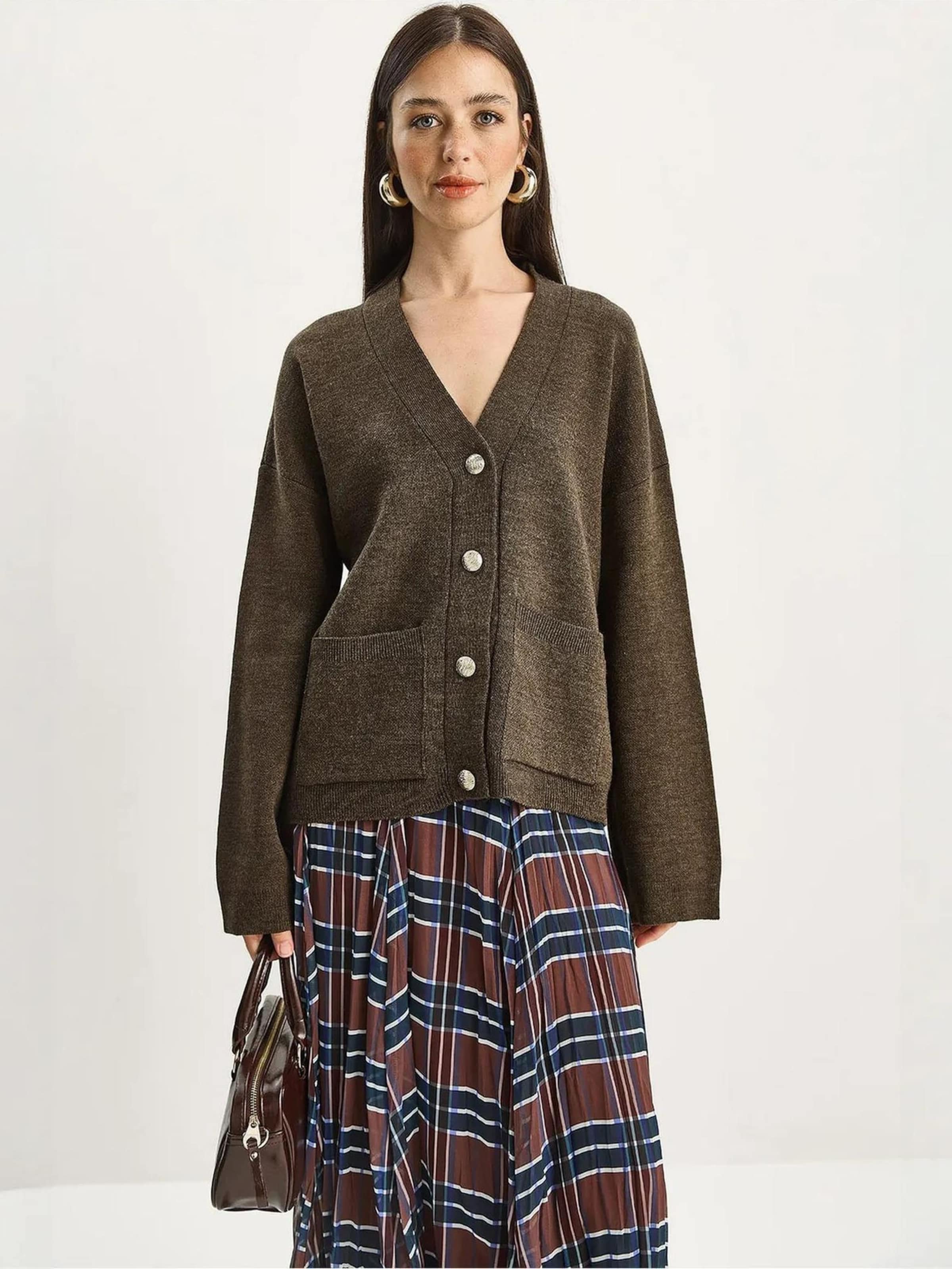 Bianco Lucci Вязаный кардиган в коричневом цвете
Bianco Lucci Вязаный кардиган в коричневом цвете