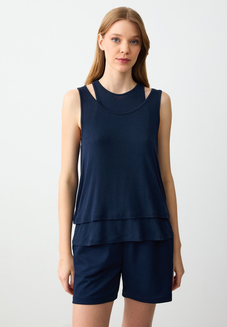 Топ Jimmy Key LAYERED SLEEVELESS, Dark Blue
Топ Jimmy Key LAYERED SLEEVELESS, Dark Blue