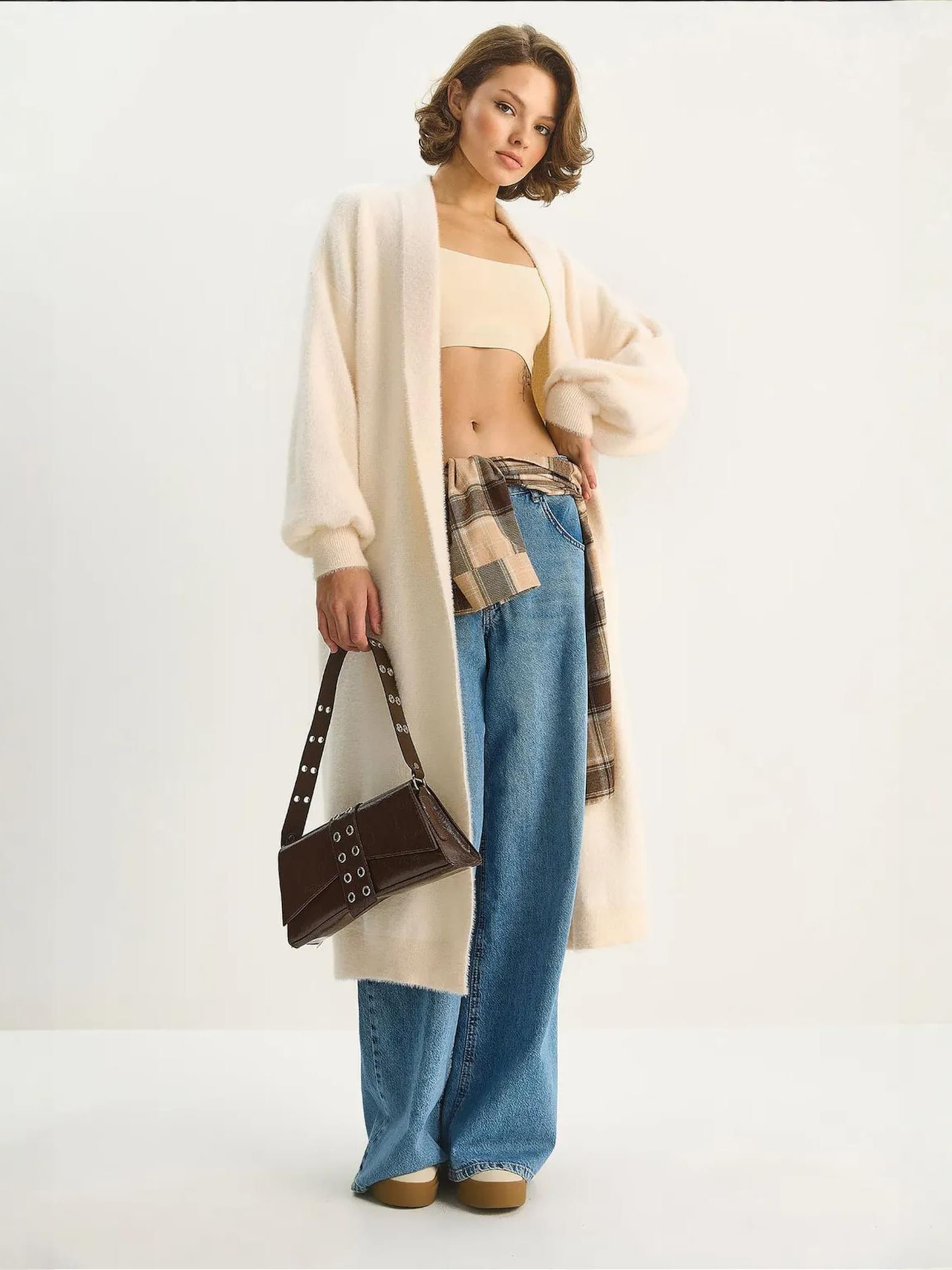 Bianco Lucci Вязаное пальто в натуральном белом цвете
Bianco Lucci Вязаное пальто в натуральном белом цвете