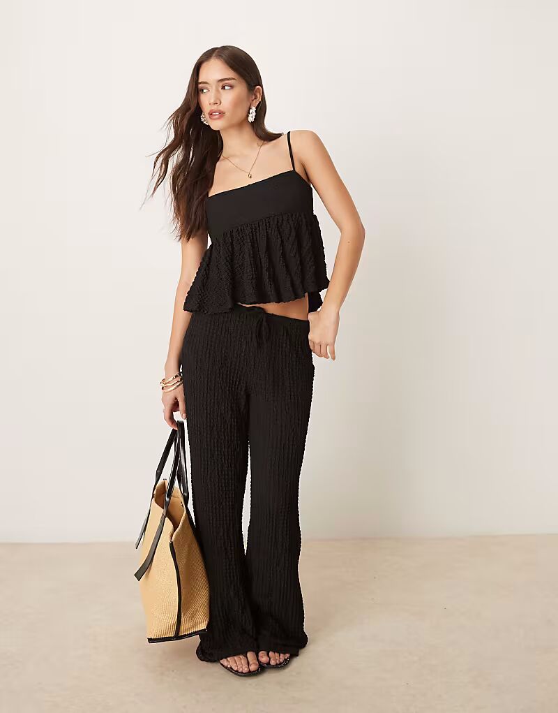 Брюки прямого кроя Mango с текстурой черного цвета
Брюки прямого кроя Mango с текстурой черного цвета