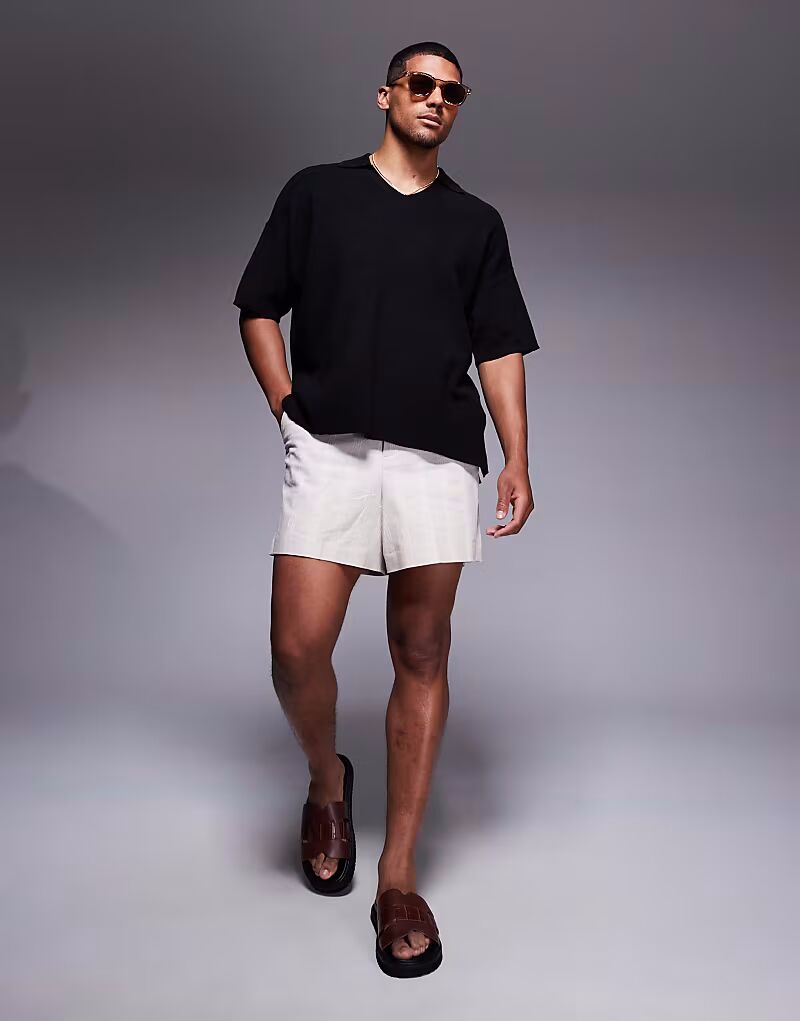 Трикотажное поло свободного кроя с разрезом на шее ADPT черного цвета
Трикотажное поло свободного кроя с разрезом на шее ADPT черного цвета