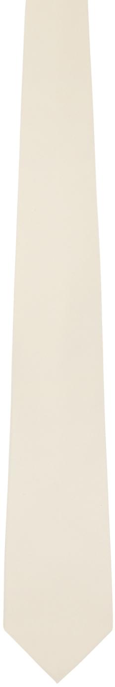 Галстук из бежевой суперлегкой шерсти AURALEE
Галстук из бежевой суперлегкой шерсти AURALEE