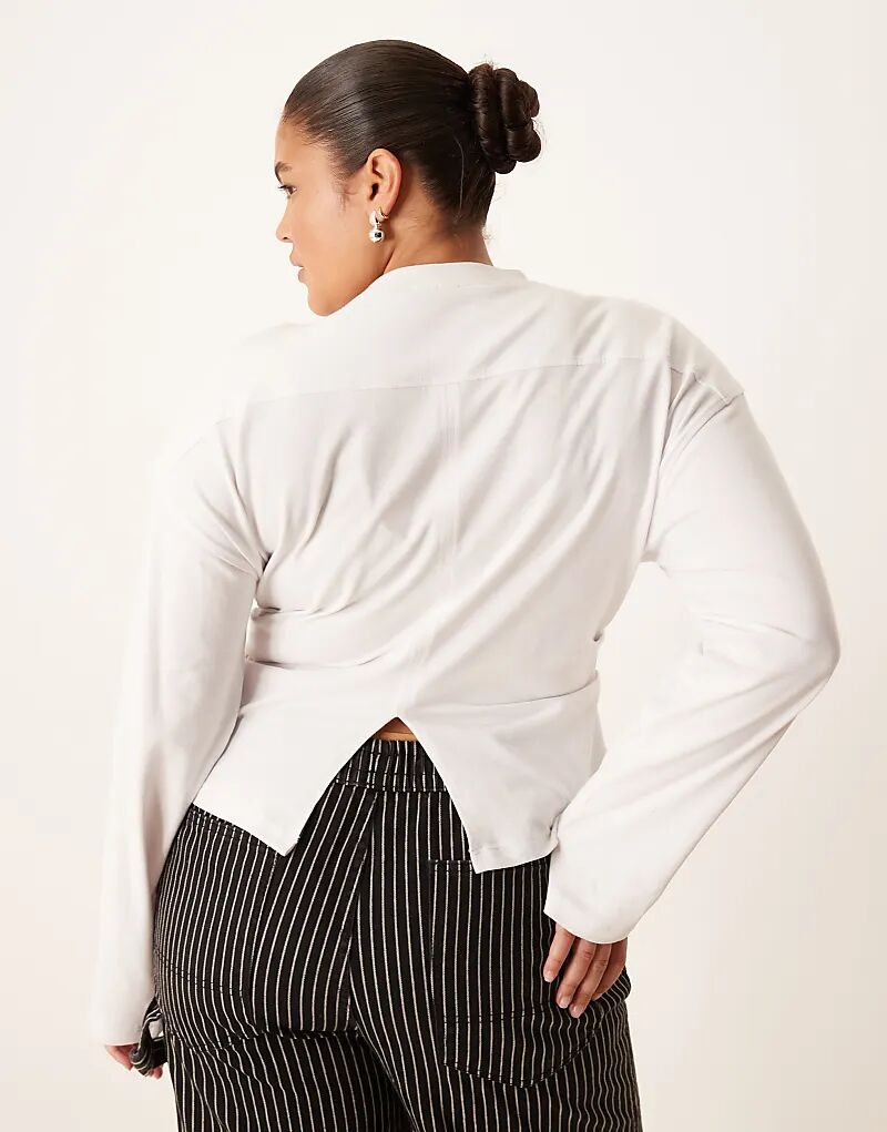 Белая футболка с длинными рукавами и корсетом ASOS DESIGN Curve
Белая футболка с длинными рукавами и корсетом ASOS DESIGN Curve