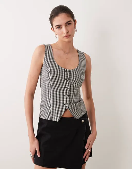 Жилет в мелкую клетку с круглым вырезом Abercrombie & Fitch
Жилет в мелкую клетку с круглым вырезом Abercrombie & Fitch