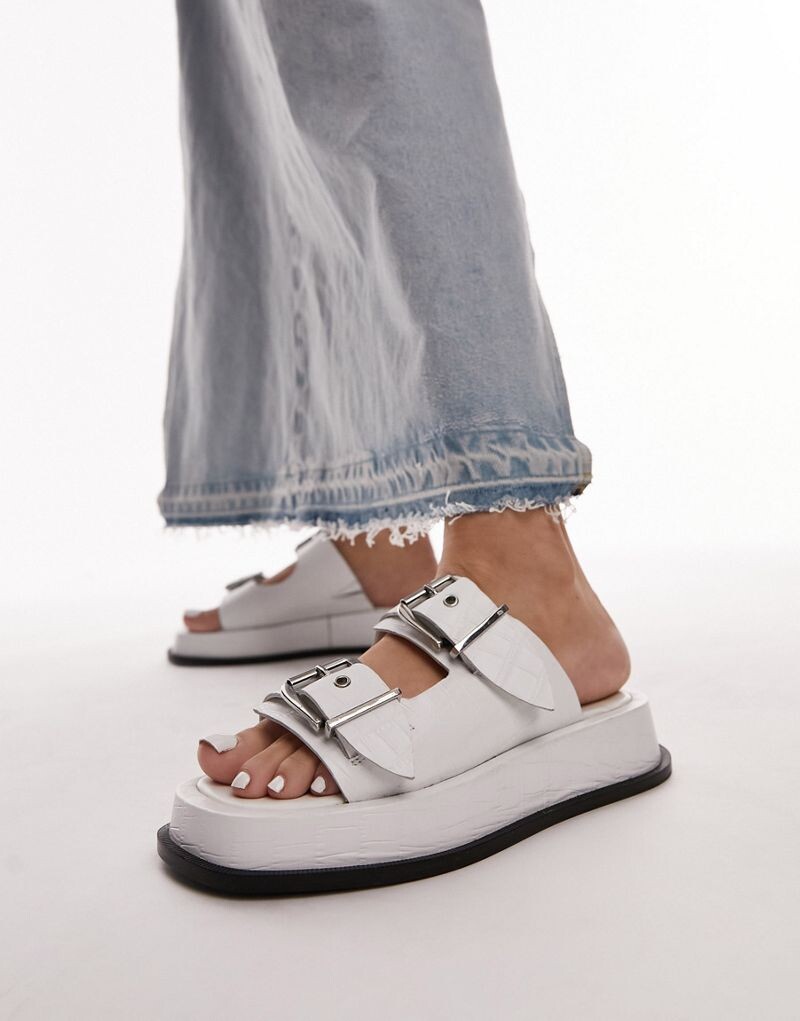 Topshop - Katie - Белые босоножки из кожи с эффектом крокодила на массивной подошве
Topshop - Katie - Белые босоножки из кожи с эффектом крокодила на массивной подошве