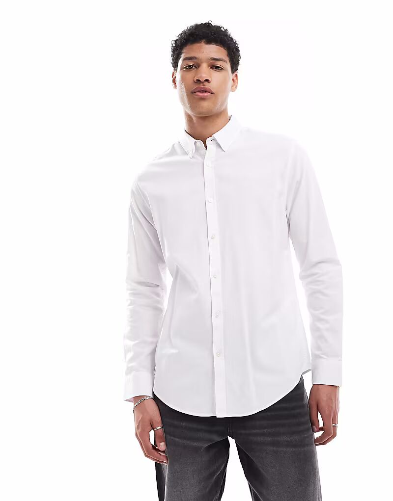 Рубашка облегающего кроя из хлопка Оксфорд с длинными рукавами белого цвета Threadbare
Рубашка облегающего кроя из хлопка Оксфорд с длинными рукавами белого цвета Threadbare