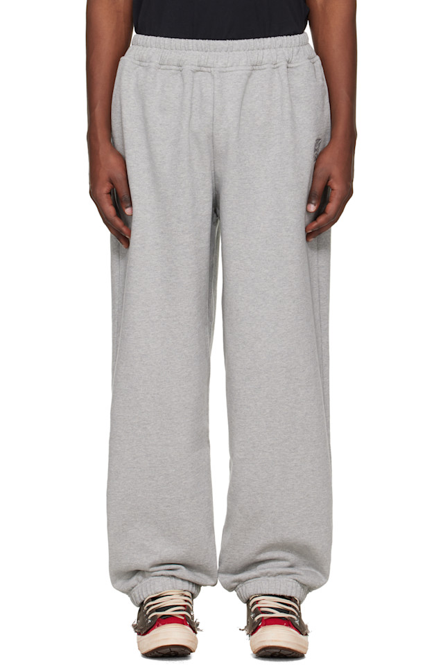 Vetements Серые спортивные штаны с логотипом байкерского креста
Vetements Серые спортивные штаны с логотипом байкерского креста